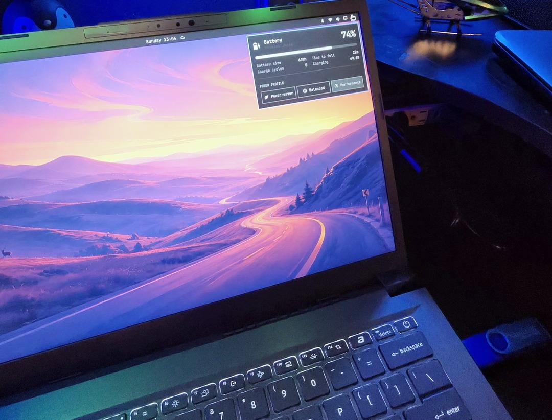 Hyprland desktop, battery panel open