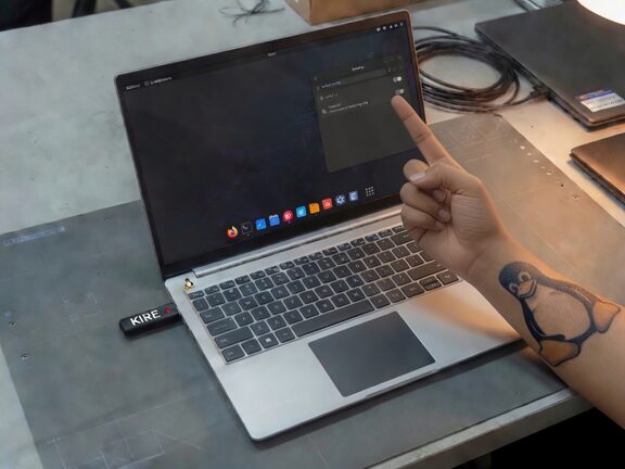 An engineer shutting Copilot off while installing Linux on a new notebook