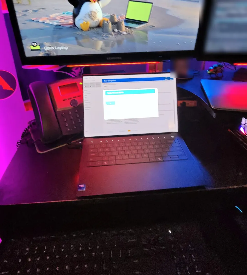 Dell XPS 14 open on the bench at the setup screen before the install