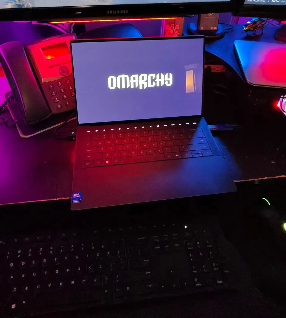 Omarchy installer splash on the XPS 14 OLED display
